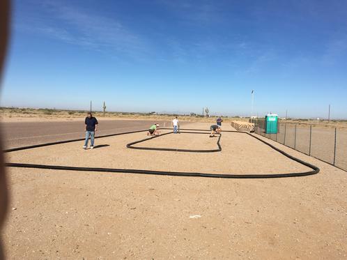 Members and guests construct the club RC car track on October 29, 2016