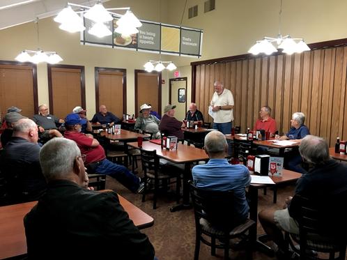 Board member and Safely Officer Win Koch giving field safety talk at club annual dinner.